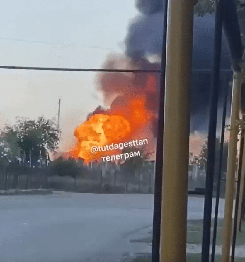 Large fire with black smoke.