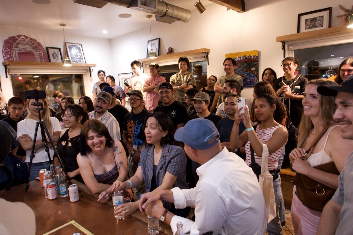 Several people fill the room at Picaresca Barra de Café in Boyle Heights.