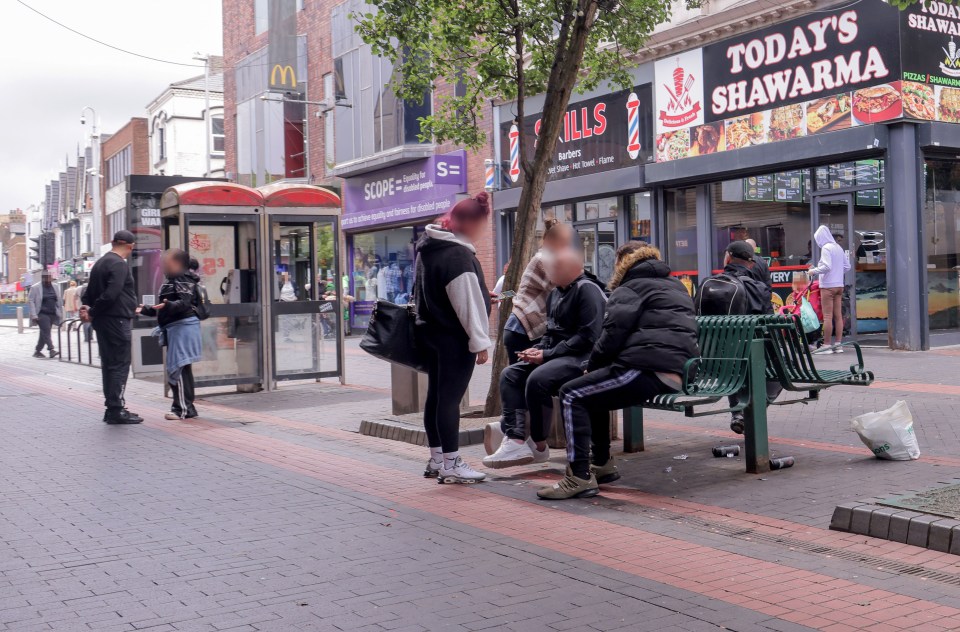 People gathered on a Middlesbrough street.