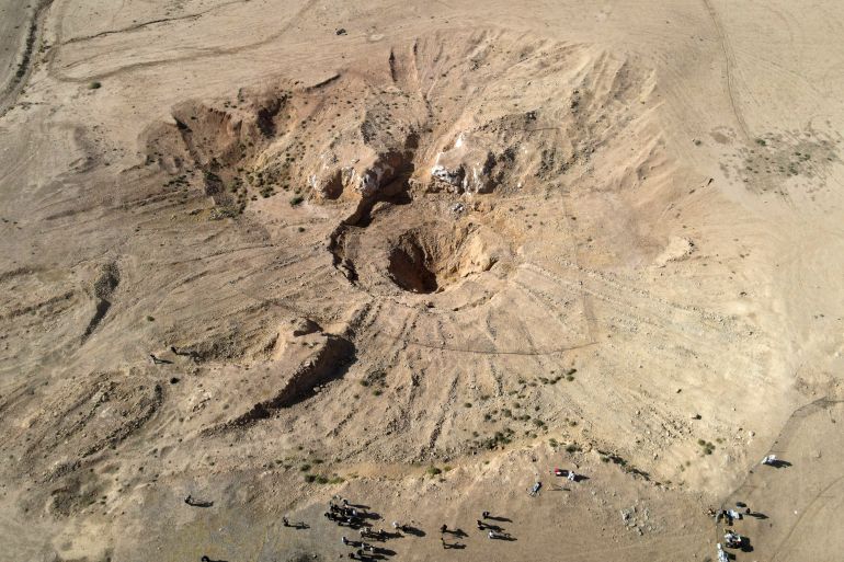 This aerial view shows a sinkhole at the Khasfa site near the northern Iraqi city of Mosul