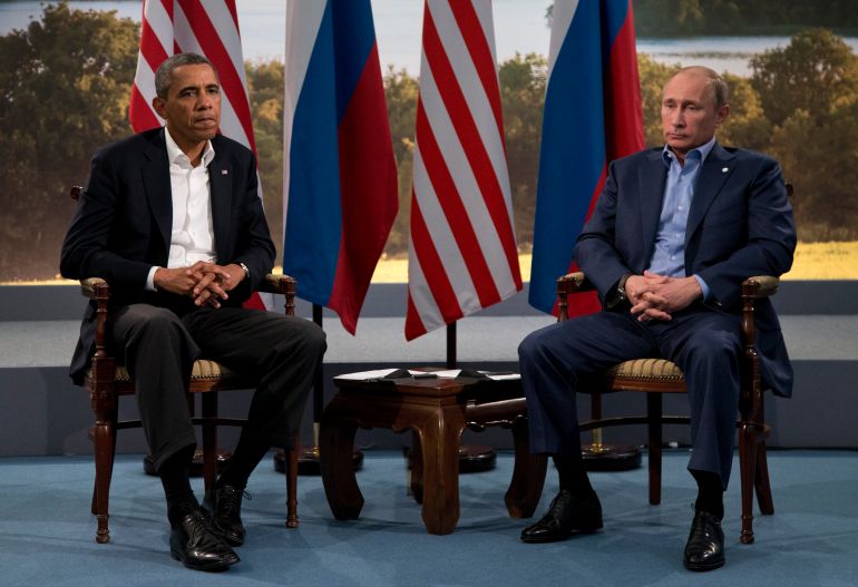 FILE In this Monday, June 17, 2013 file photo President Barack Obama meets with Russian President Vladimir Putin in Enniskillen, Northern Ireland. (AP Photo/Evan Vucci, File)