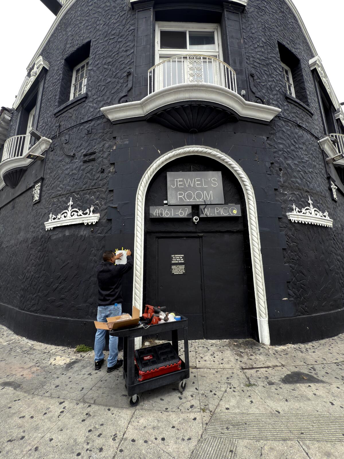 Jewel's Catch One in Mid-City, a building with a black exterior. 