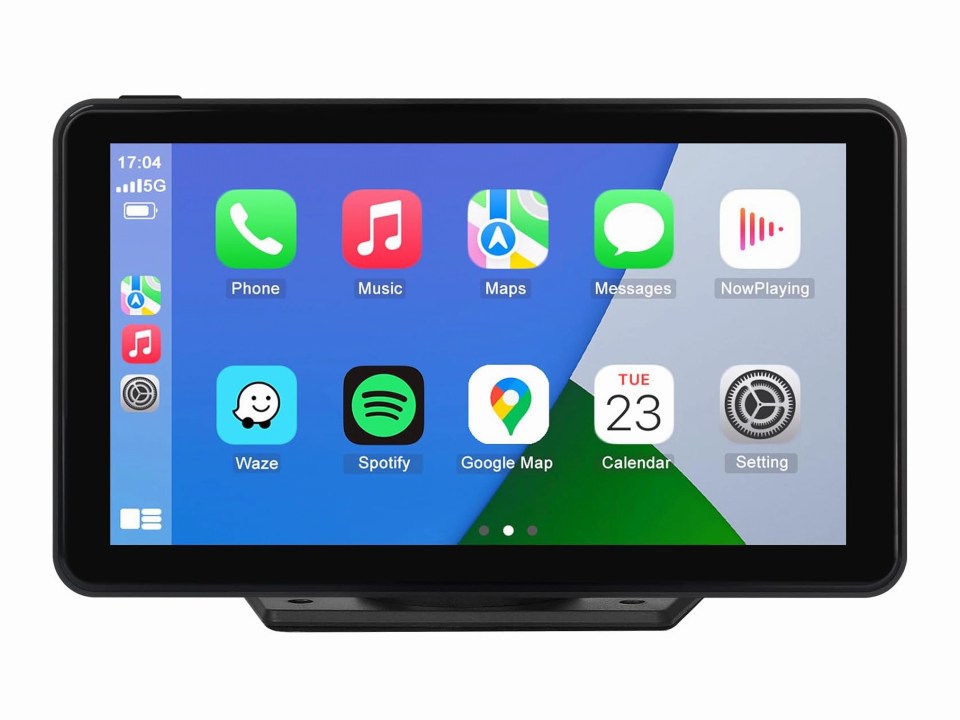 Car stereo display showing various apps.