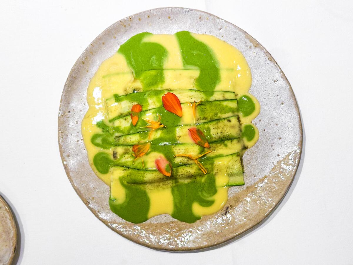 Zucchini mille-feuille with skate wing, buerre blanc and sorrel sauce at Datil restaurant in Paris.