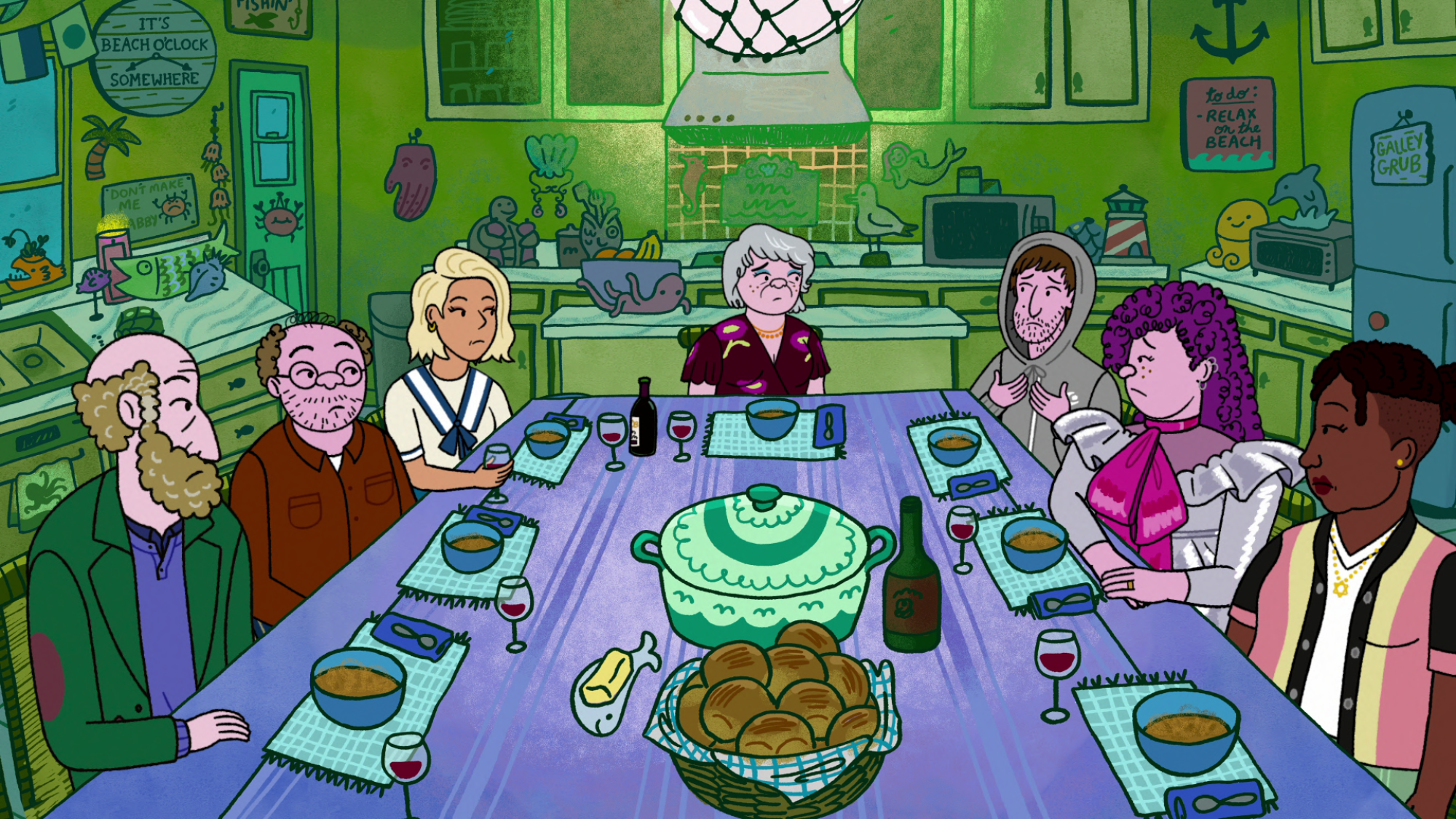 eight adults gathered around a dinner table for a meal
