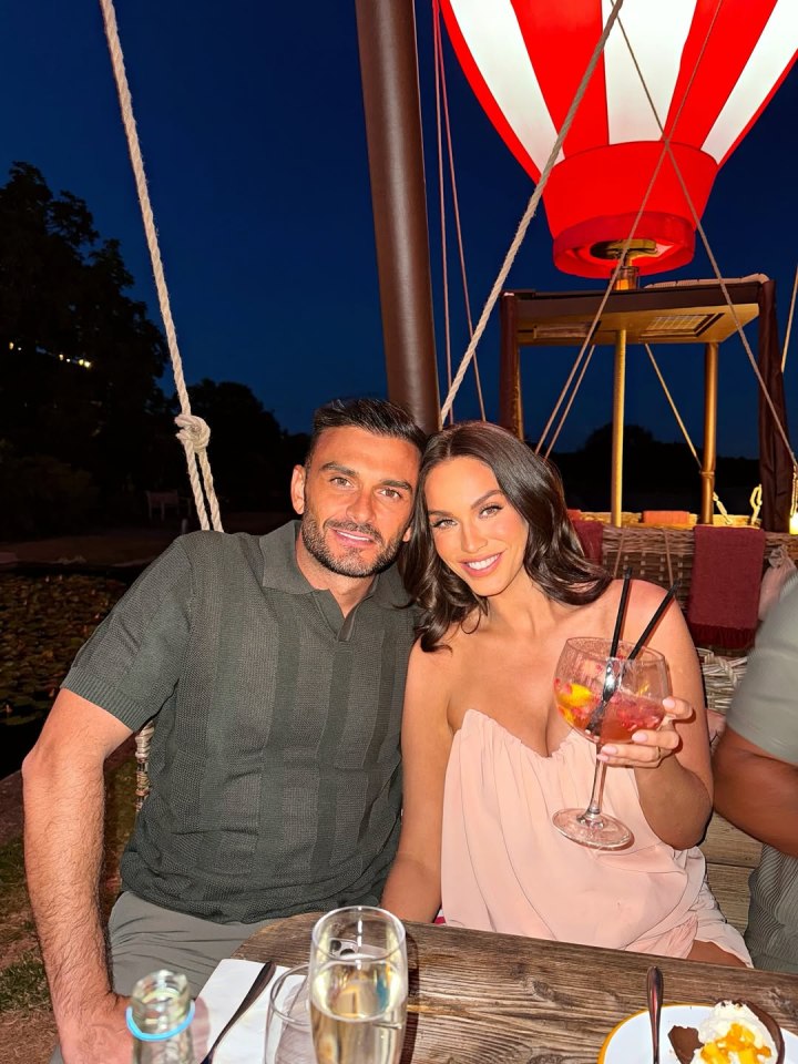 Vicki Pattison and her partner enjoying a romantic dinner under a hot air balloon.
