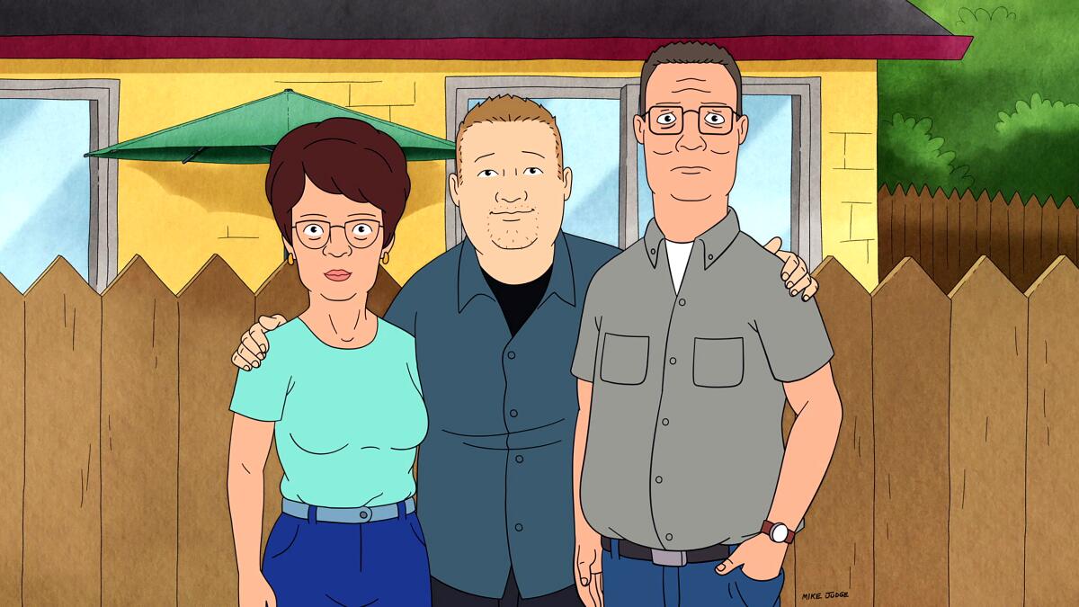 An animation still from "King of the Hill" showing older versions of Peggy, Bobby and Hank Hill. 