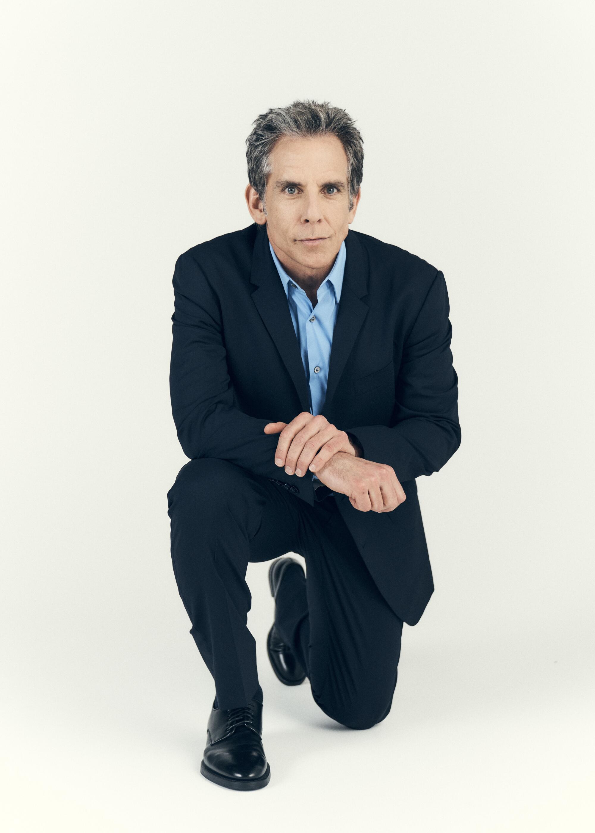 Ben Stiller kneeling