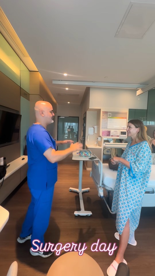 A doctor and patient in a hospital room on surgery day.