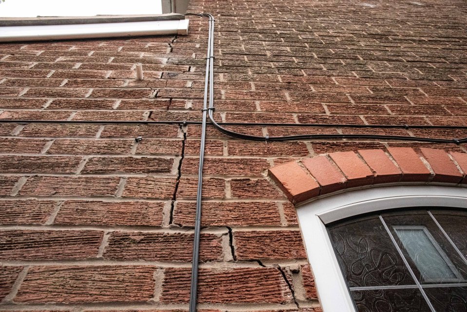 Crack in a brick wall.