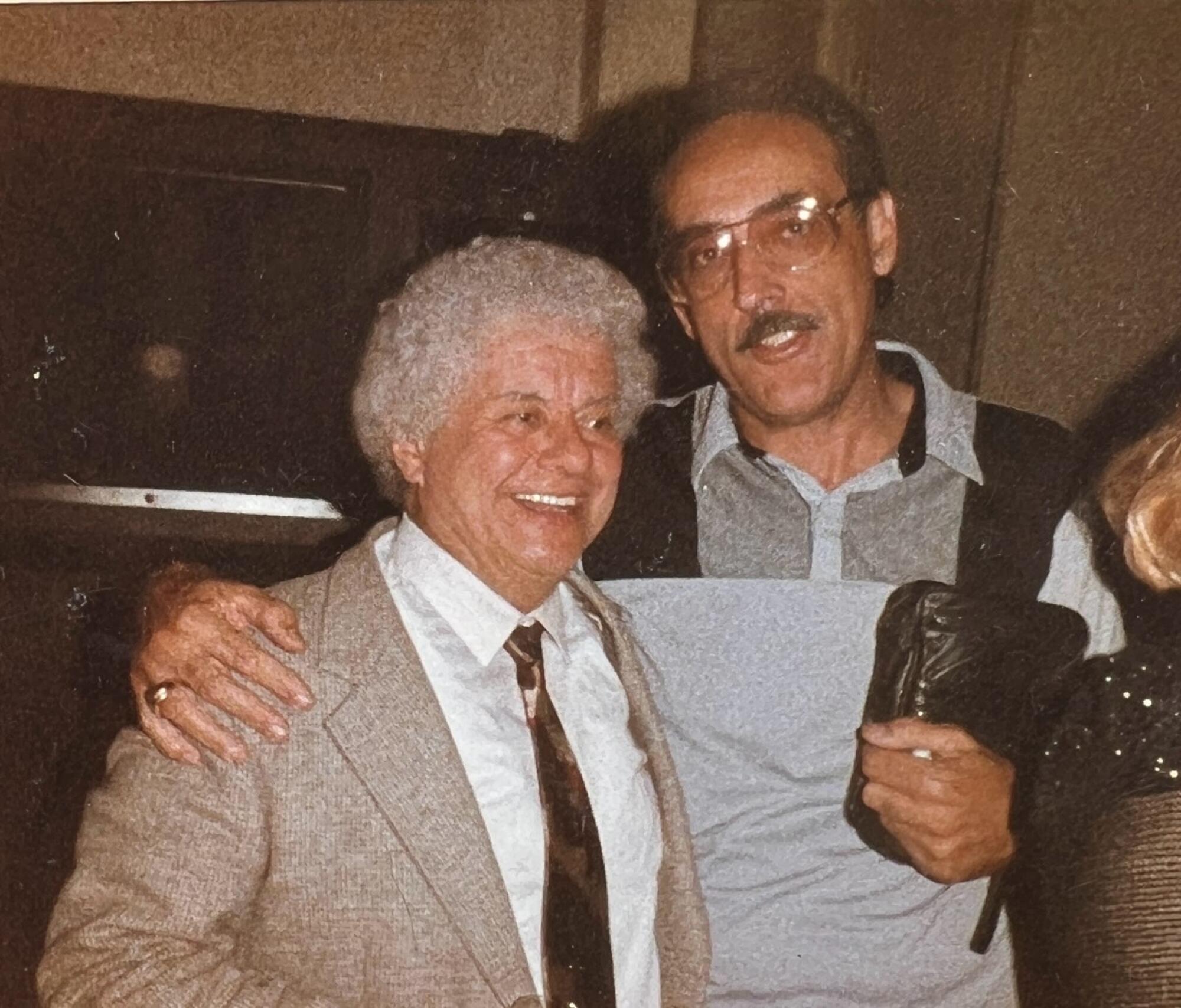 Tito Puente, left, poses for a photo with Walfredo de los Reyes Sr.