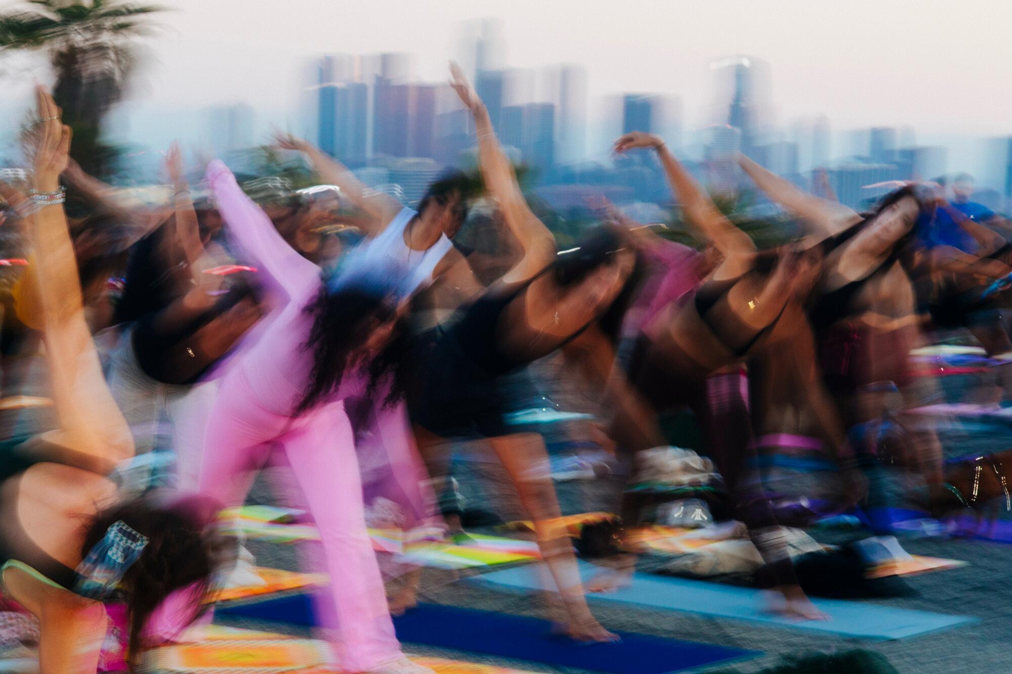 People doing yoga.