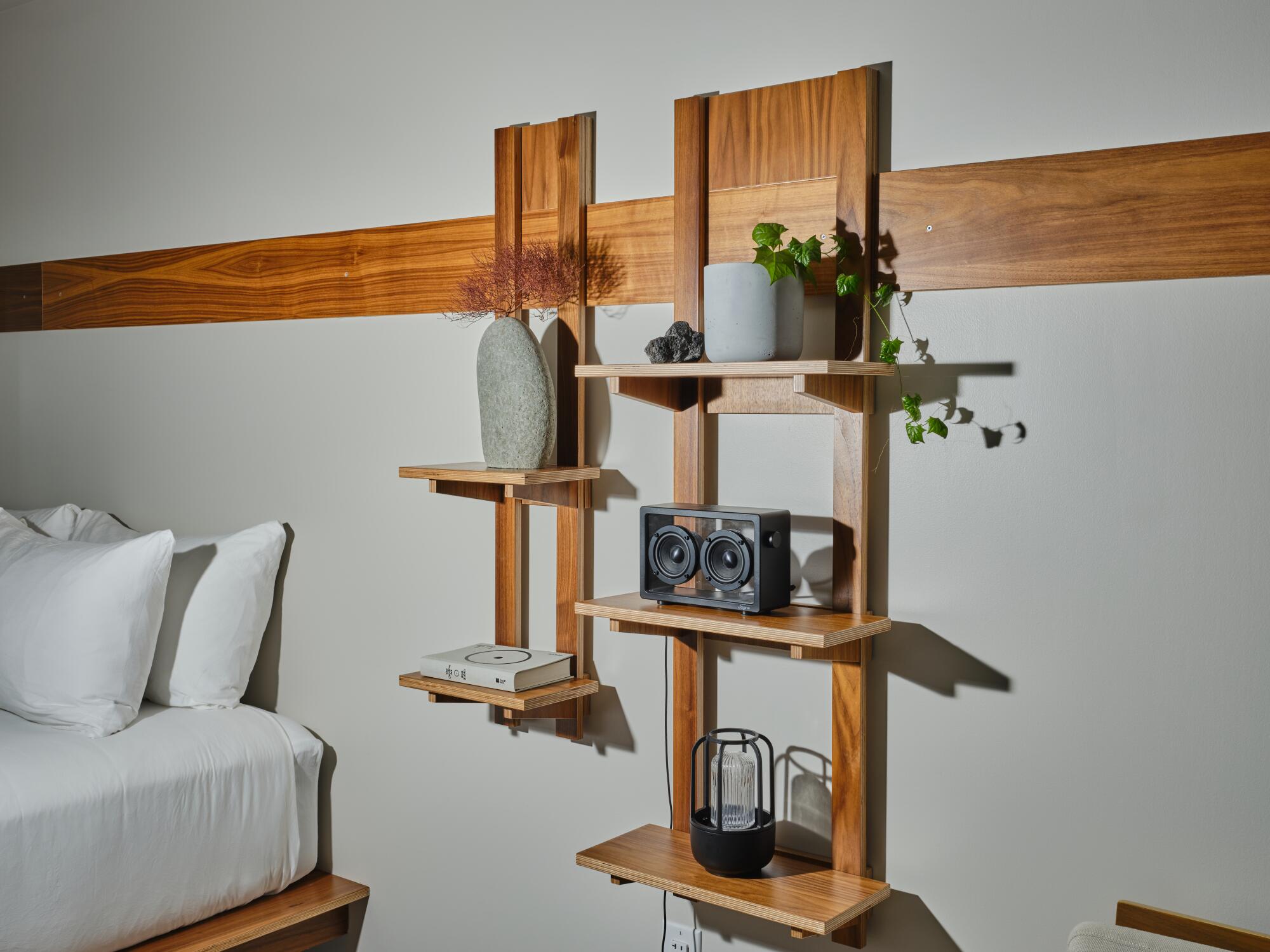 Rooms are furnished with a solar lantern, a bluetooth player and a stone vase that Uyeda made.
