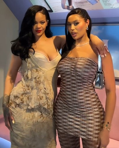 Rihanna and Ella Thomas posing together.