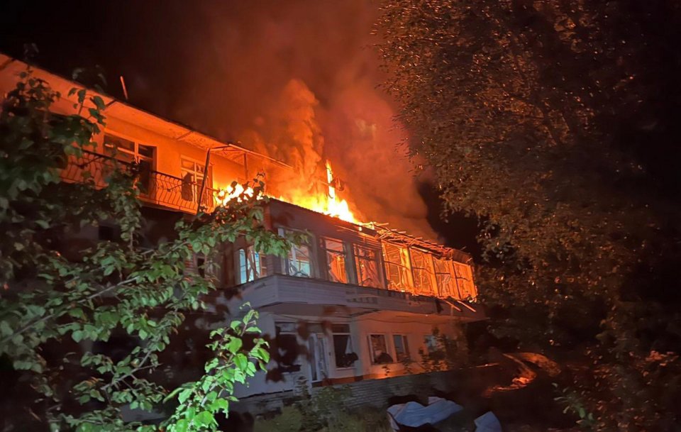 Building engulfed in flames after a Russian attack in Druzhkivka, Ukraine.