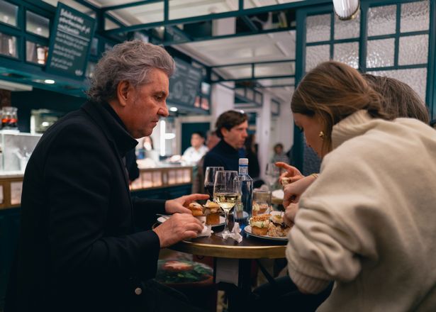 San Sebastian,Basque Spain: Locals and Tourists are ordering and enjoying eating Pinchos