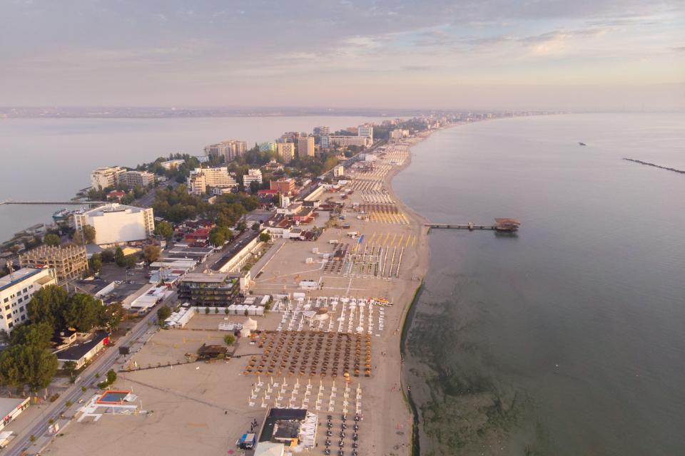 Aerial view of Mamaia coastline at sunrise.