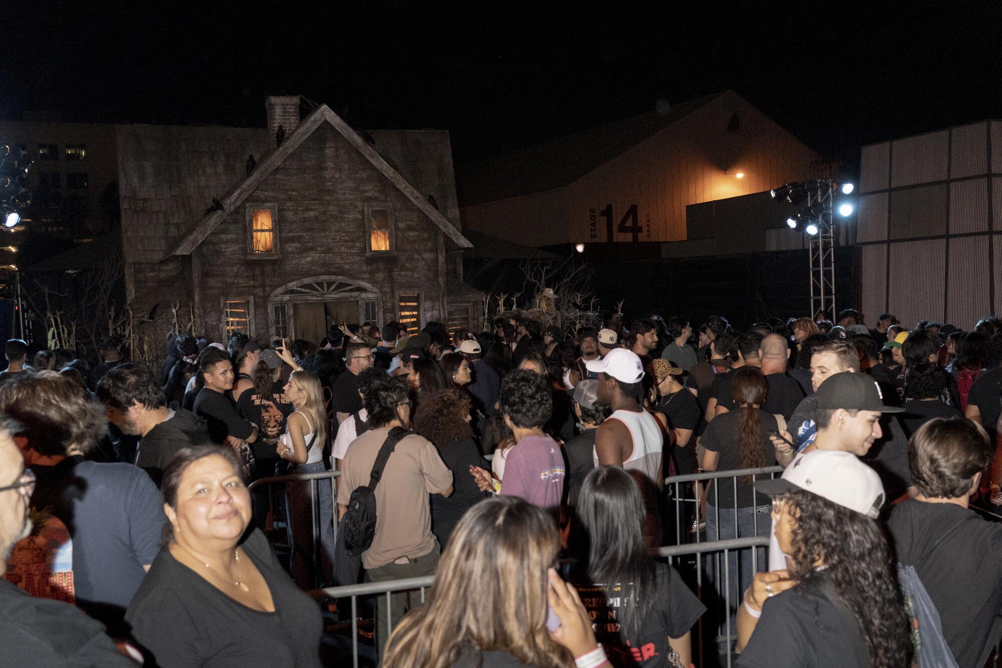 Crowds lined up to enter "Scarecrow," a haunted house at Halloween Horror Nights featuing music by Slash.