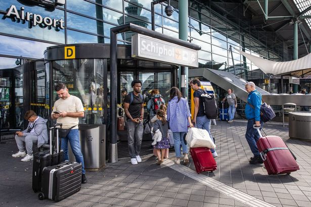 People arriving at an airport
