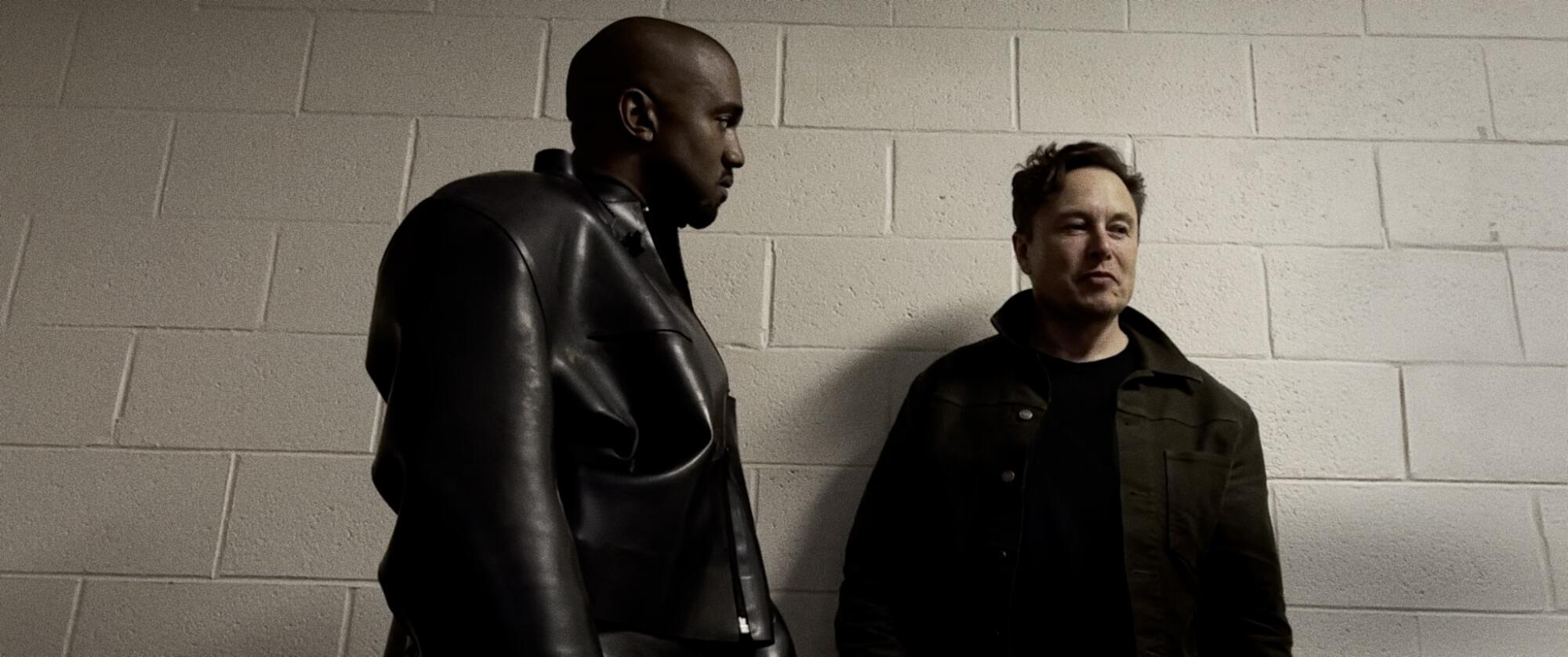 A rap star and a tech billionaire have a discussion.
