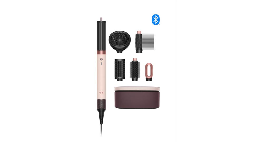 Dyson Airwrap styler and dryer with attachments and case.