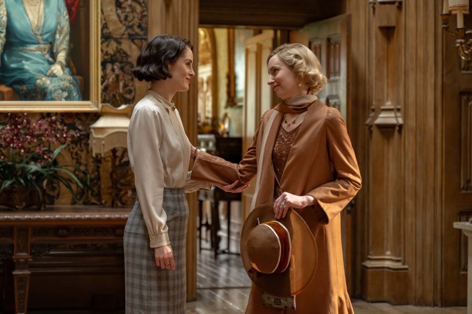 Michelle Dockery and Laura Carmichael in a scene from *Downton Abbey: The Grand Finale*.
