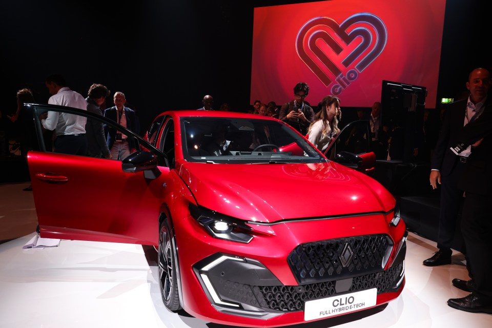 Red Renault Clio at the IAA Mobility 2025 car show in Munich.