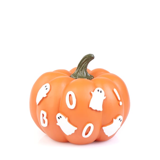 Halloween pumpkin decorated with ghosts and "BOO!"