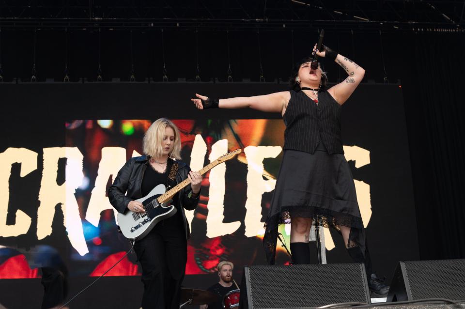 The Crawlers performing live on stage.