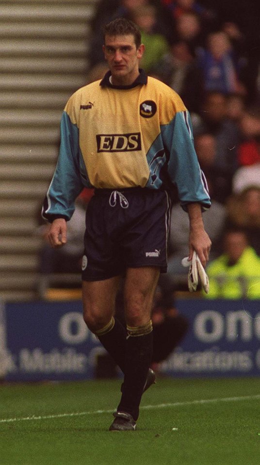 Russell Hoult, assistant manager of Hereford United F.C. at a soccer match.