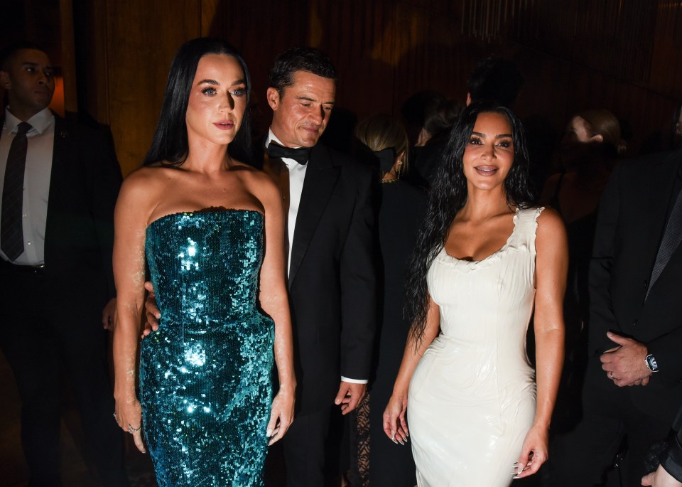 Katy Perry, Orlando Bloom, and Kim Kardashian at a fashion event.