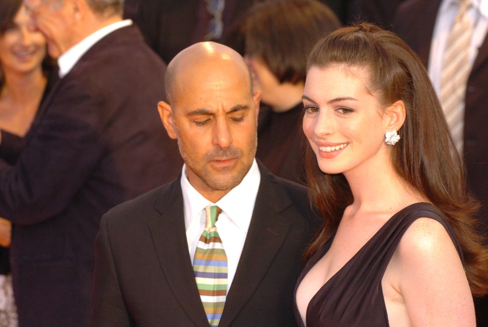 Stanley Tucci and Anne Hathaway at a film festival.