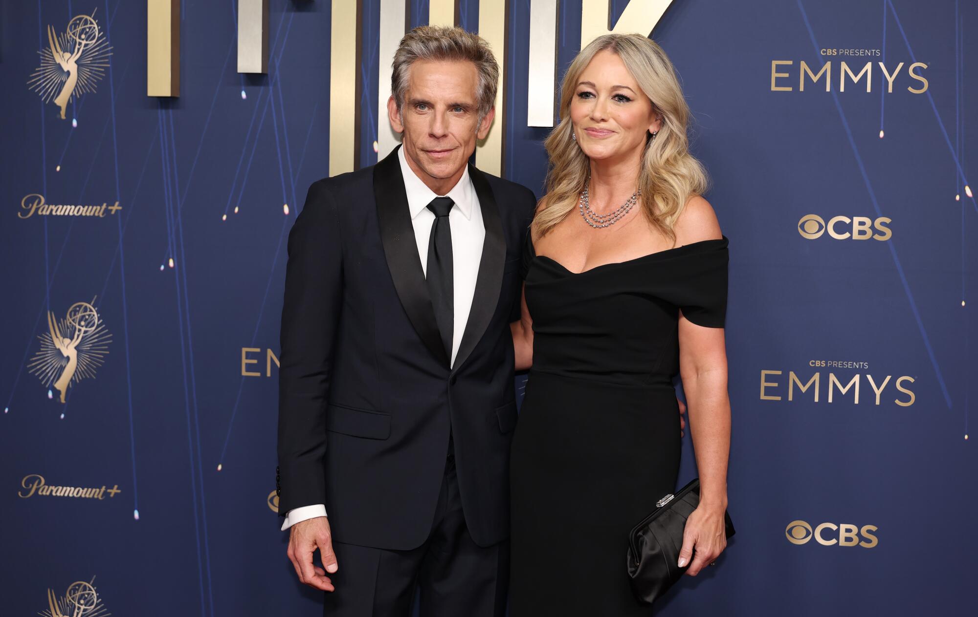 Ben Stiller and Christine Taylor pose side by side.