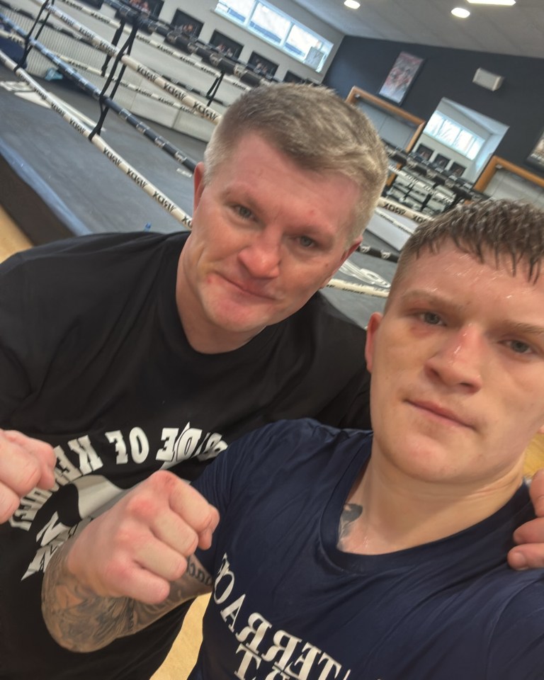 Campbell and Ricky Hatton in a boxing gym.