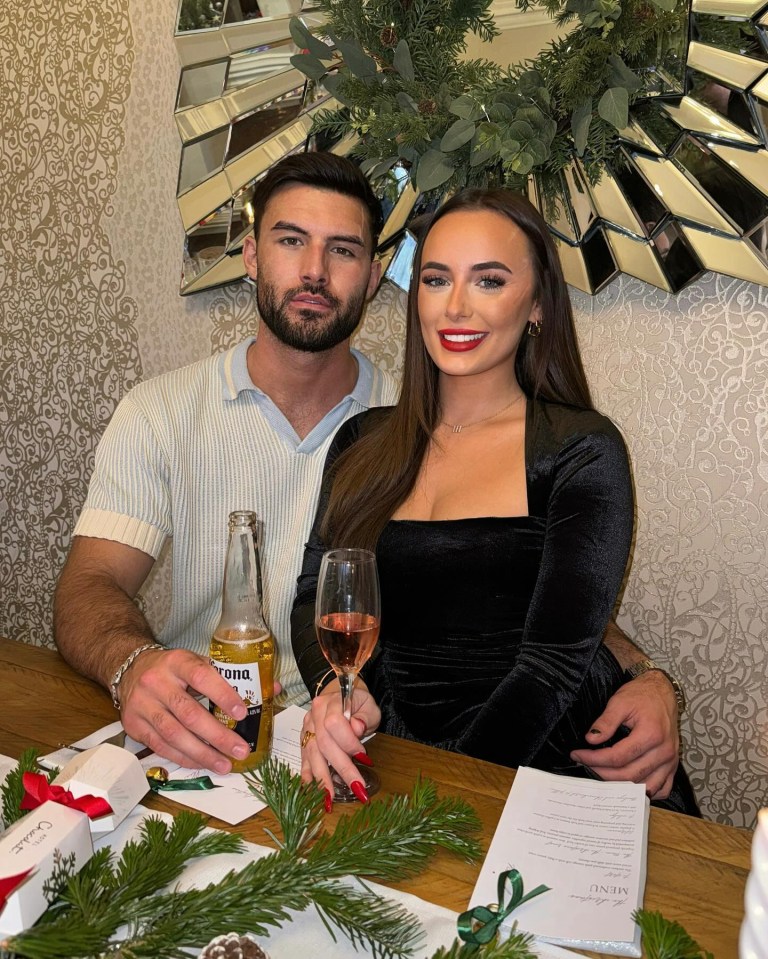 Millie Court and Liam Reardon at a table.