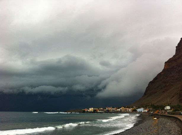 Storm and heavy rain clouds getting nearer at Valle Gran Rey, Beach La Playa. On the canary island of La Gomera.