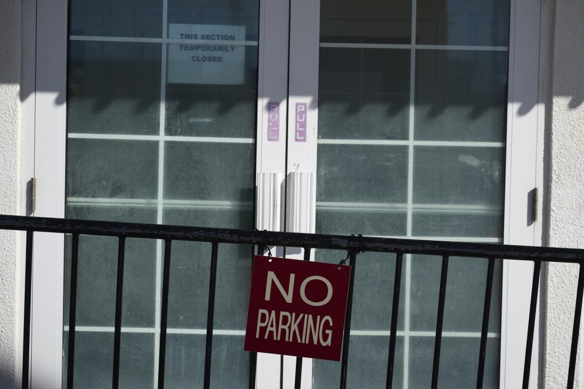 A sign blocks an entrance to the Primm Mall
