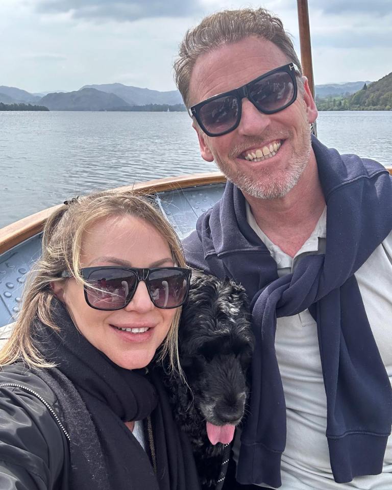 Rita Simons with Ben Jordan and their dog on a boat.
