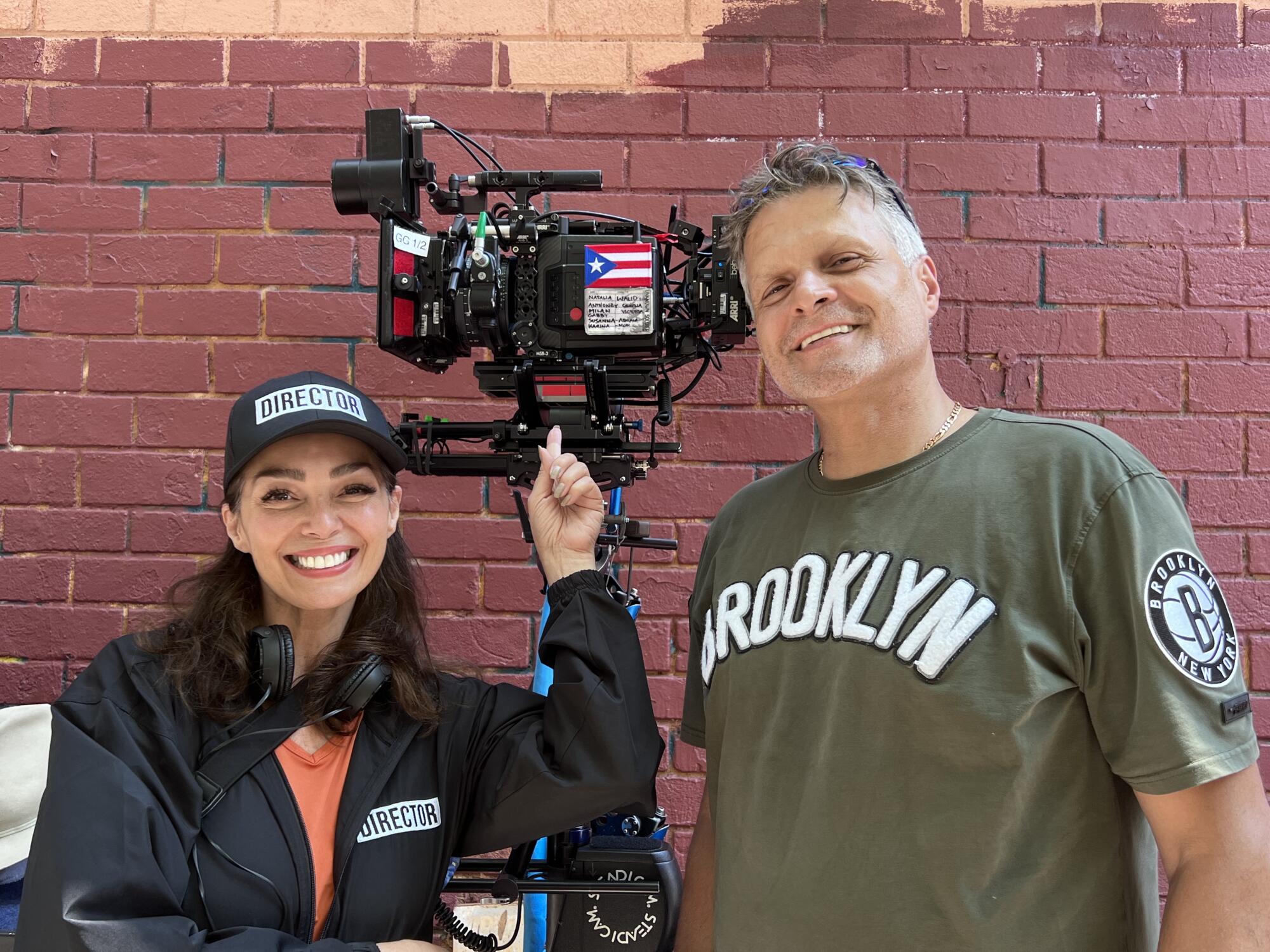 Director Elaine Del Valle poses with her brother, Benjamin Medina, who also worked on set.