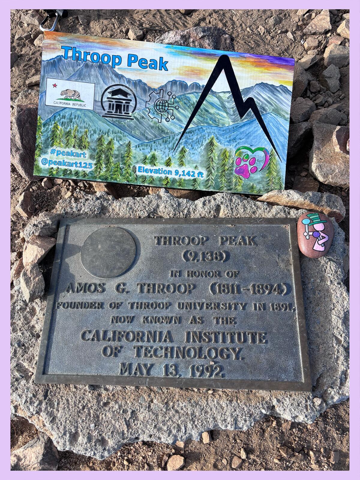 The official and unofficial signs that mark the summit of Throop Peak.