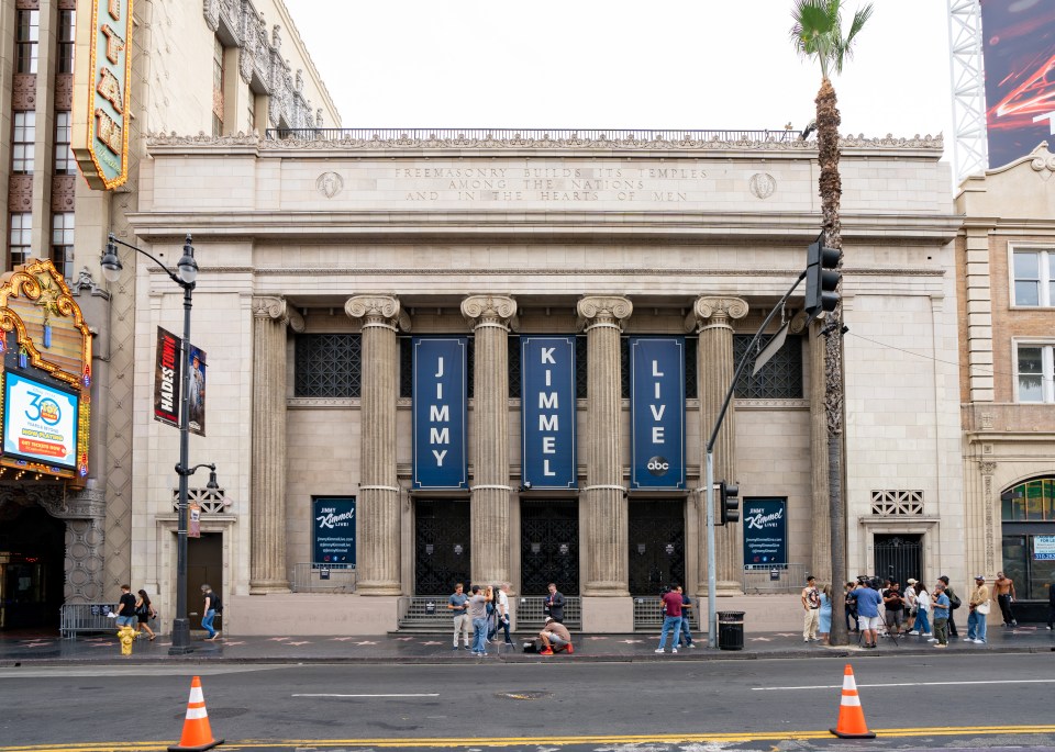 The exterior of the El Capitan Entertainment Centre, home of ABC's "Jimmy Kimmel Live!", with "Jimmy Kimmel Live" banners hanging from columns.
