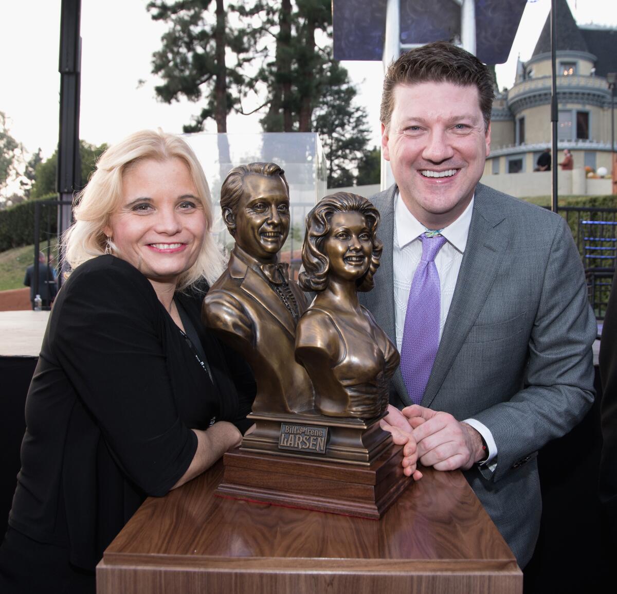 Erika Larsen, president of Magic Castle Enterprises, and mansion owner Randy Pitchford.