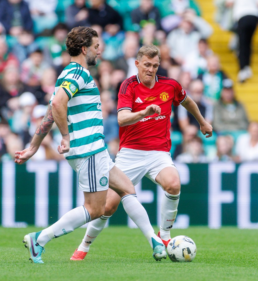 Charlie Mulgrew and Darren Fletcher playing in a charity football match.