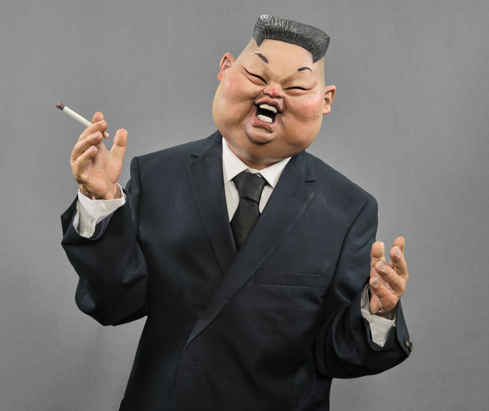 Caricature of Kim Jong-un wearing a suit and holding a lit cigarette, with his mouth open in laughter.