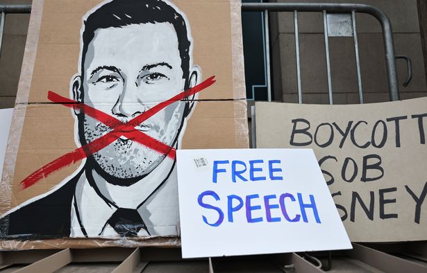 Signs left by demonstrators protesting the suspension of the Jimmy Kimmel Live! show 