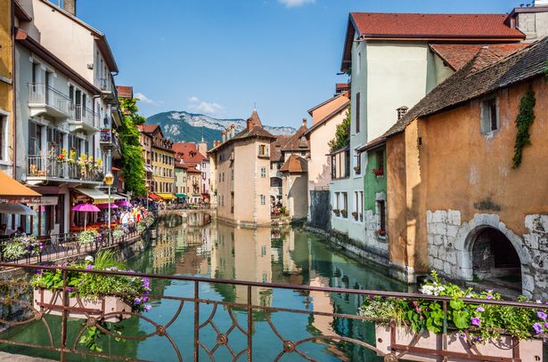 France, Annecy, view of River Thiou and Palais de I'lle in Vielle Ville pitouresque old town.