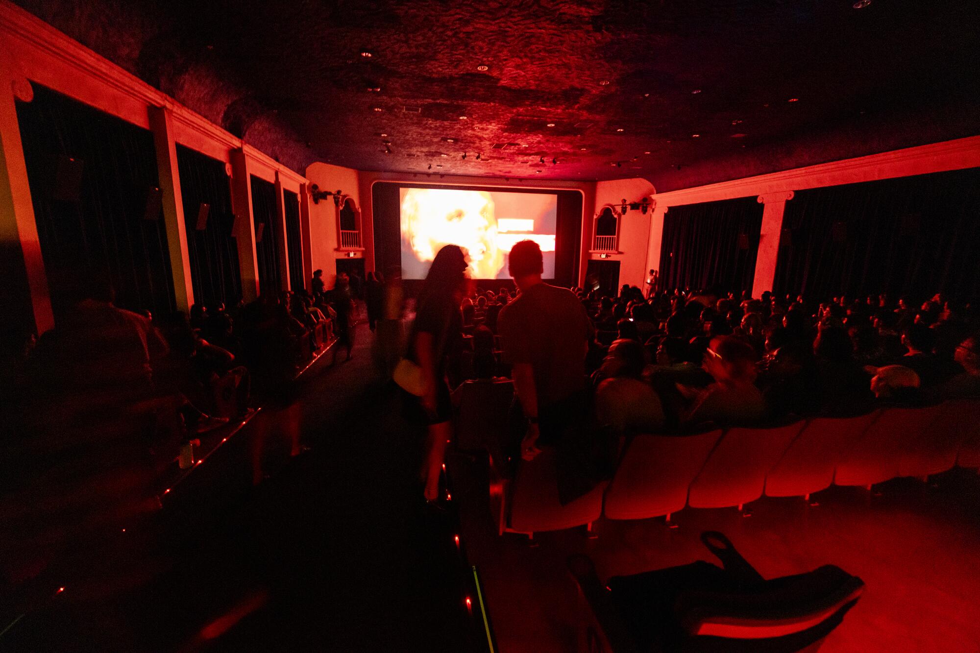 Guests enter the movie theater at Vidiots in Los Angeles.