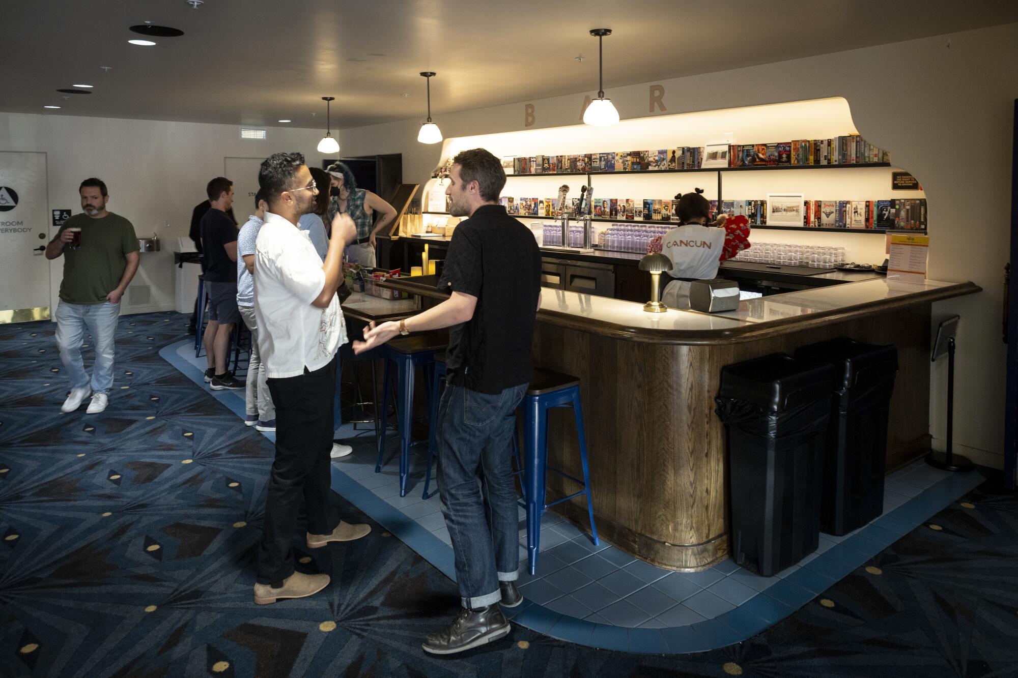Patrons at the bar of the Vidiots' cinema in Los Angeles.