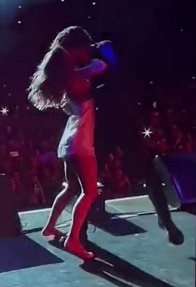 Pete Wicks and Jowita Przystał share a passionate kiss on stage at London's O2.