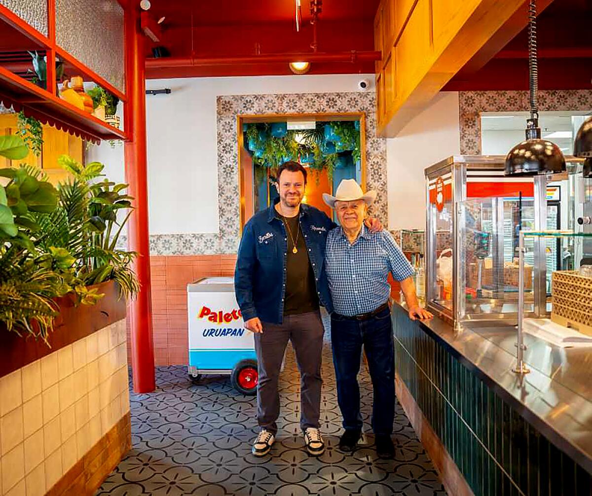 Marcos Carbajal, left, and his father Inocencio Carbajal at their Little Village location of Carnitas Uruapan in Chicago.